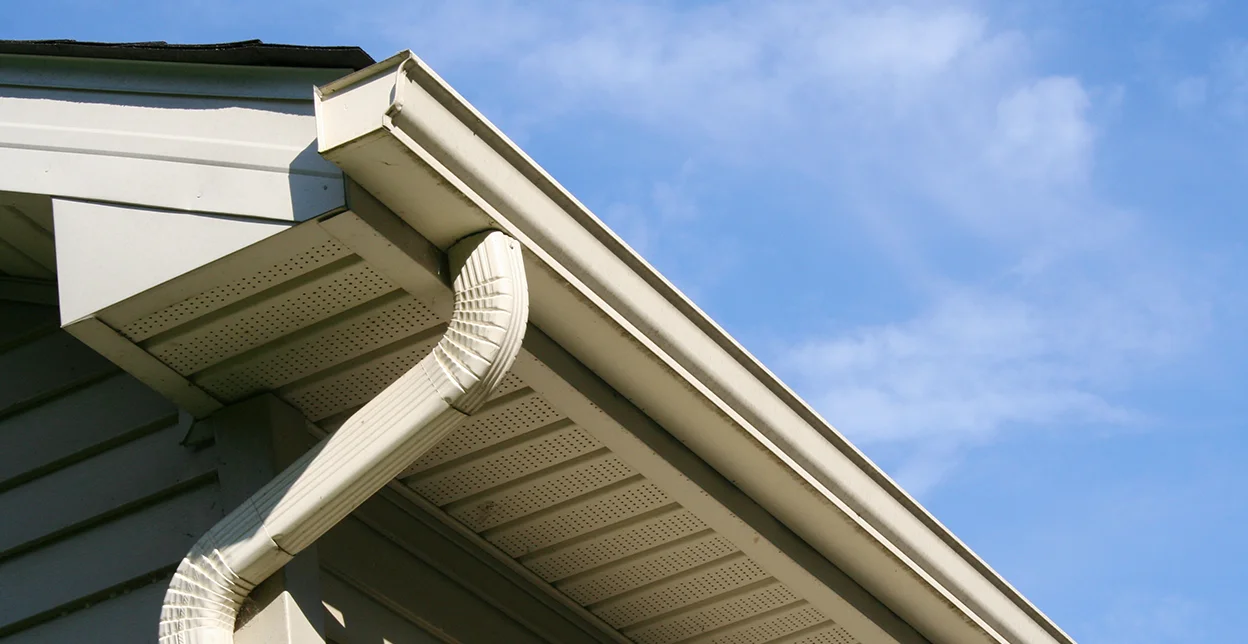 Roof side gutter drainage.