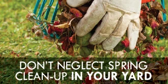 Person cleaning a yard with text: 