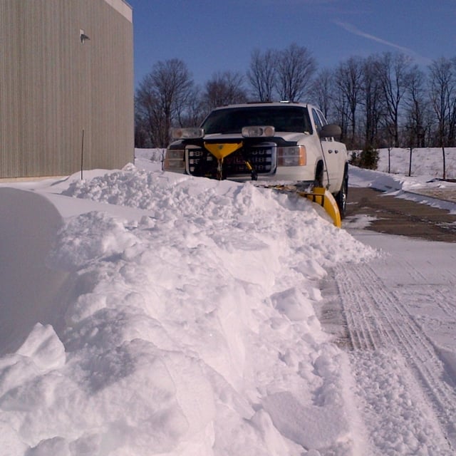 vehicle in snowfall way